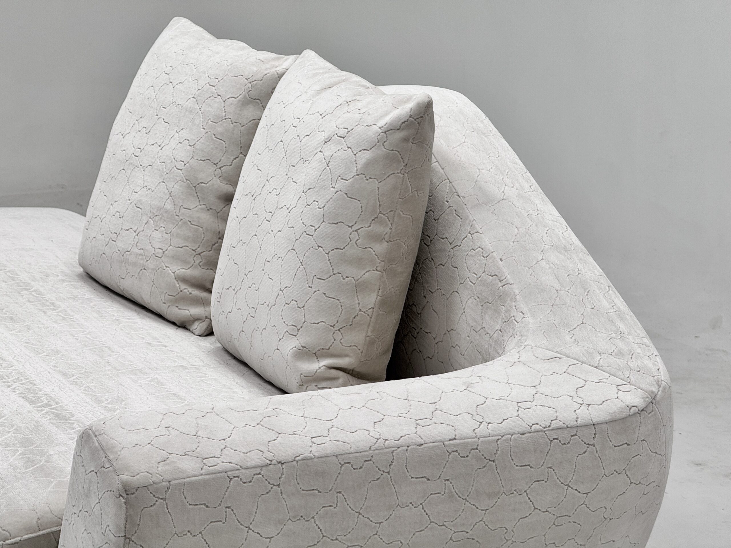 Irregular curved sofa with beige texture in Middle Eastern villa - Image 3